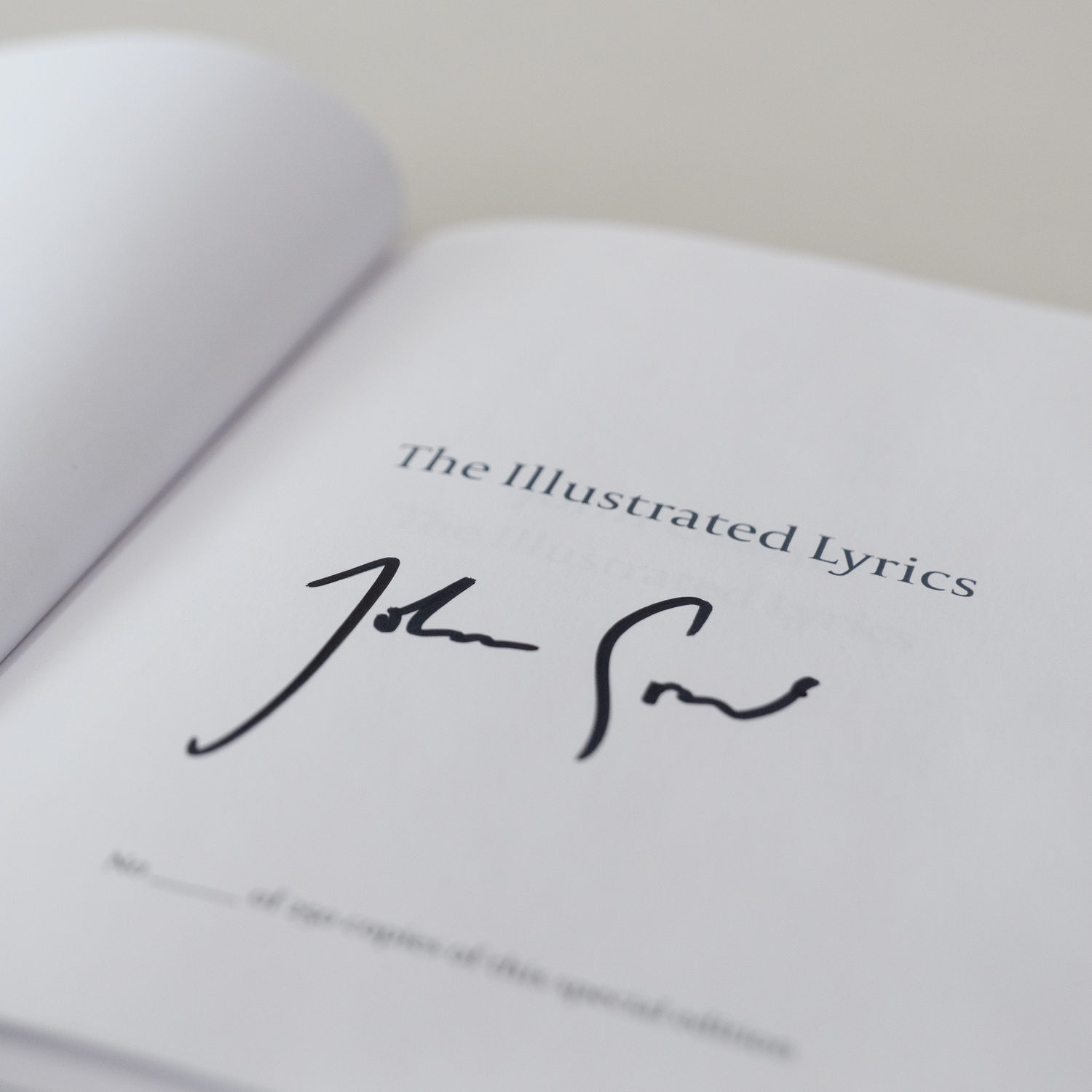 The signed title page of The Illustrated Lyrics