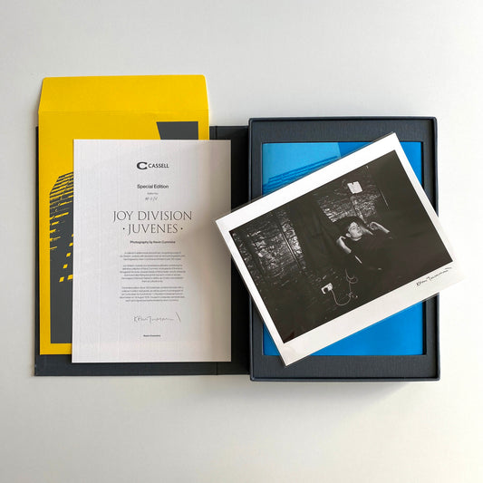 Kevin Cummins' Joy Division collectable photographic book is laid out in the clamshell case showing the signed black and white photo of Joy Division, certificate of authenticity and envelope