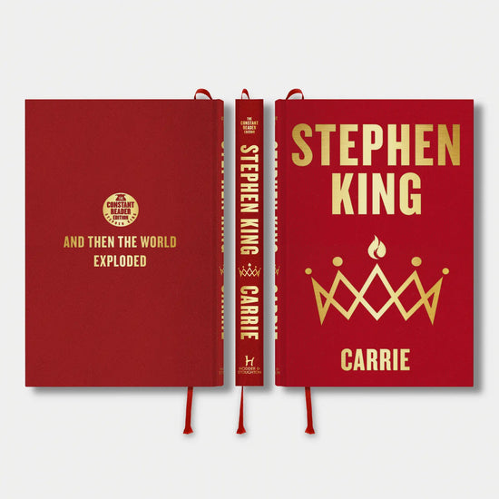 Image shows front, spine and back cover of the edition in red cloth and gold foil blocking. A red ribbon marker is bound into the book.